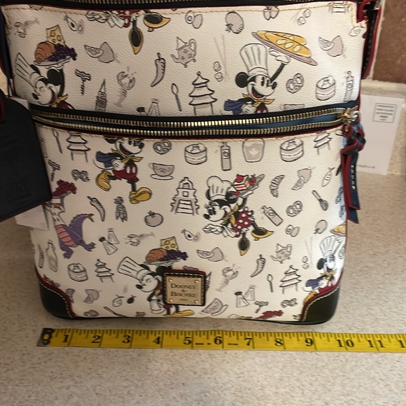 A EPCOT Food and wine festival Dooney and Bourke from 2018. - Picture 5 of 7